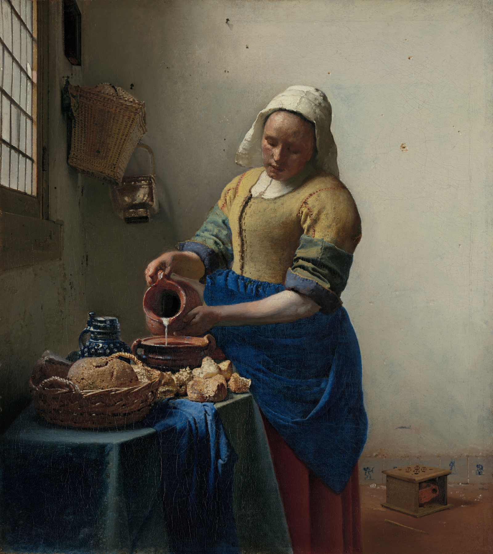 The Milkmaid (c. 1658–1660), Rijksmuseum: the famous pointillés of light on the bread — Wikimedia Commons.